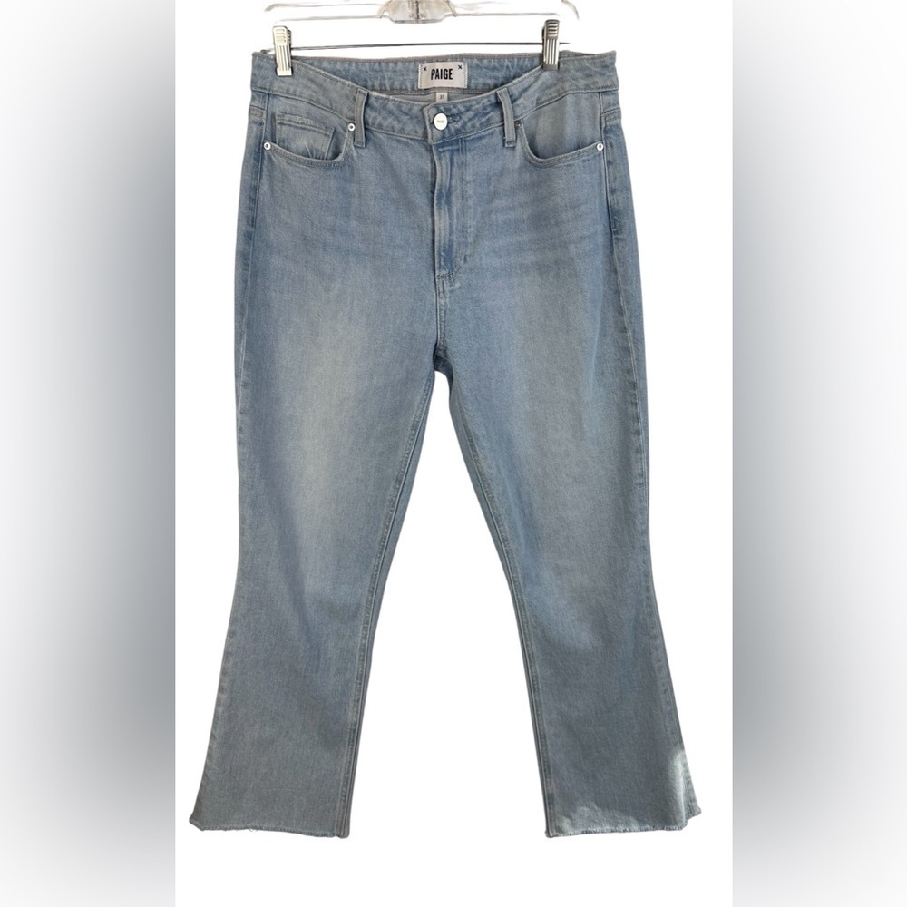 Paige women’s light wash frayed edge Collete Crop Flare jeans. Size 31